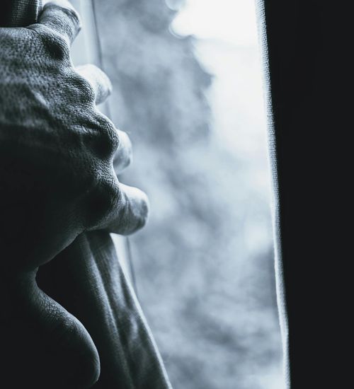 Silhouette of a person in a powerful pose against a menthol background.
